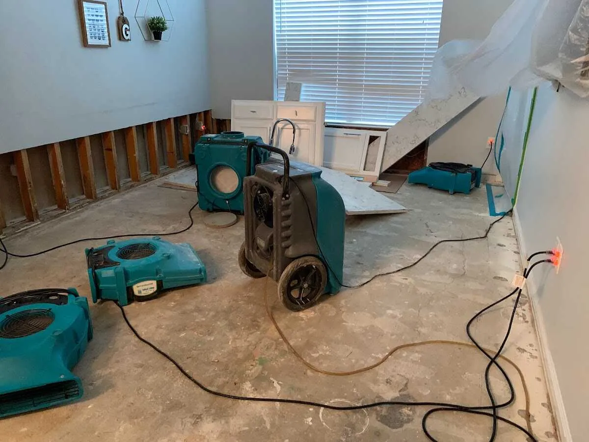 Dehumidifier in flood-cut room for Water Damage Restoration in Newtown